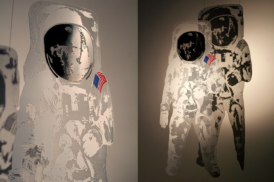 Sculpture of an astronaut in painted stainless steel