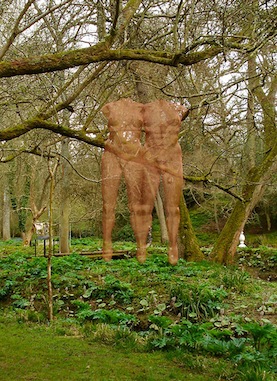 Suspended couple sculpture in sculpture garden