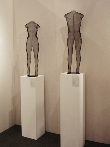 Black figurative sculptures semi-transparent