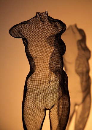 girl sculpture in wired mesh