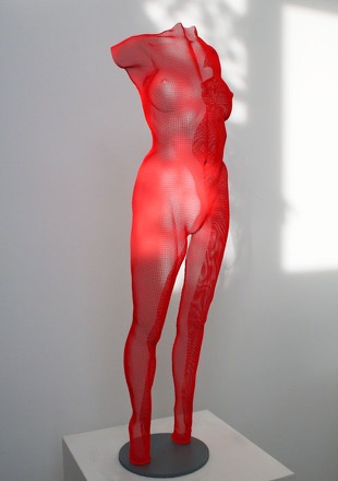 Red body sculpture of a girl - Feme by David Begbie