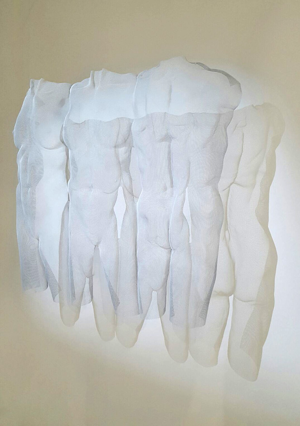 3 female torso in white wired mesh at art fair 2017