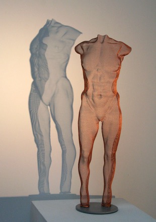 androgynous figure in semi-transparent steel by David Begbie