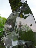 reflection of garden sculpture stainless steel